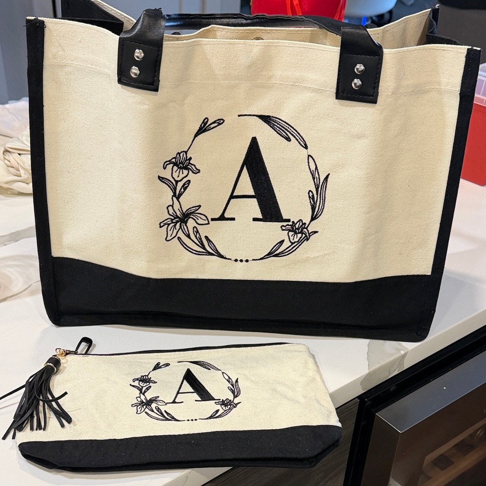 Never used monogrammed tote w/ makeup pouch